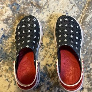 Red, white and blue Sketcher sandals